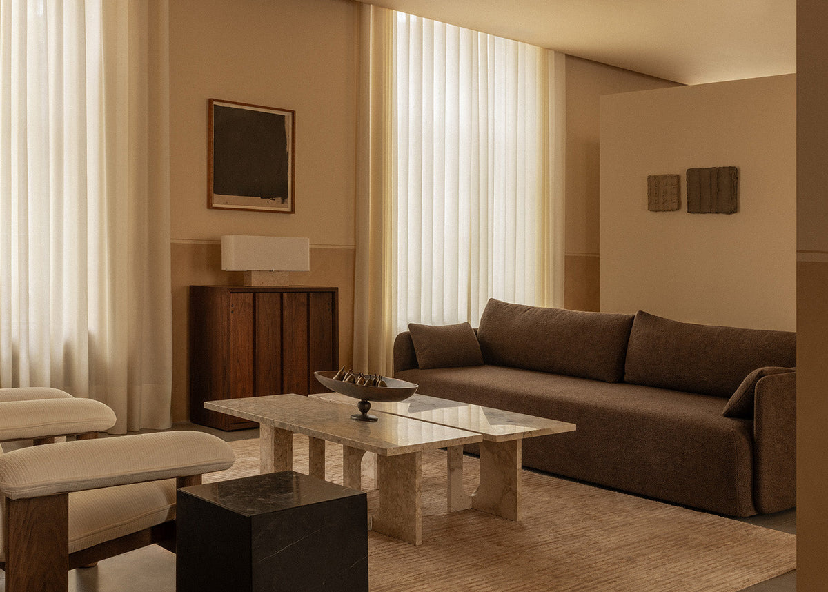 Audo Copenhagen sofa, lounge seating and stone tables inside Audo House.