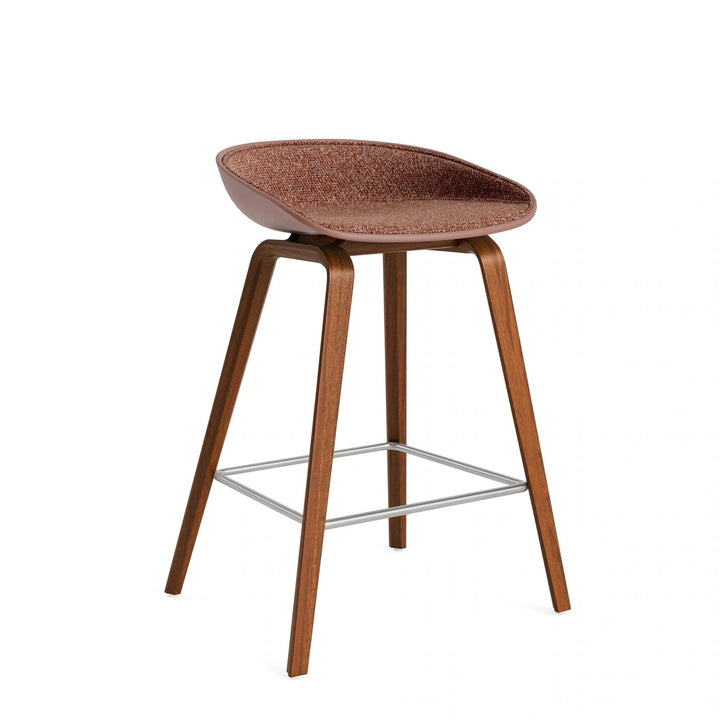 HAY AAS 32 H65 front upholstered in Loft 304, soft brick shell, lacquered walnut base and stainless steel footrest