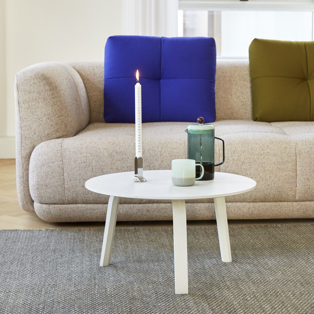Family context — room detail: HAY Quilton 3 seater Bolgheri LGG60, Bella Coffee Table dia60xH32 white wb laquer oak, Arcs Candleholder S mirror