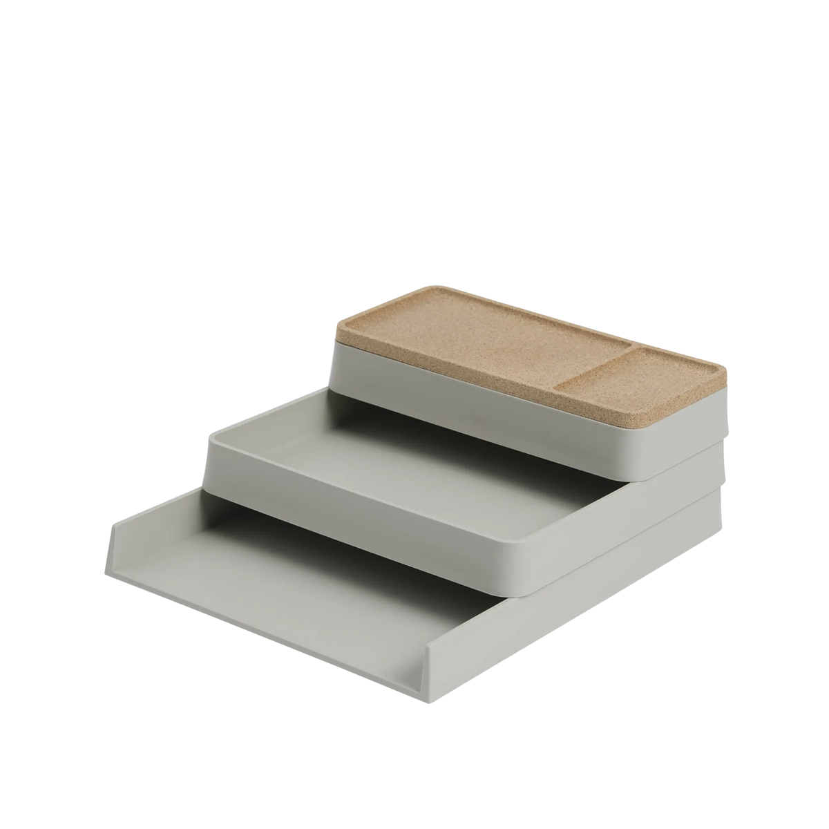 Muuto Arrange Desktop Series Combination 1: stepped grey trays with a cork lid.