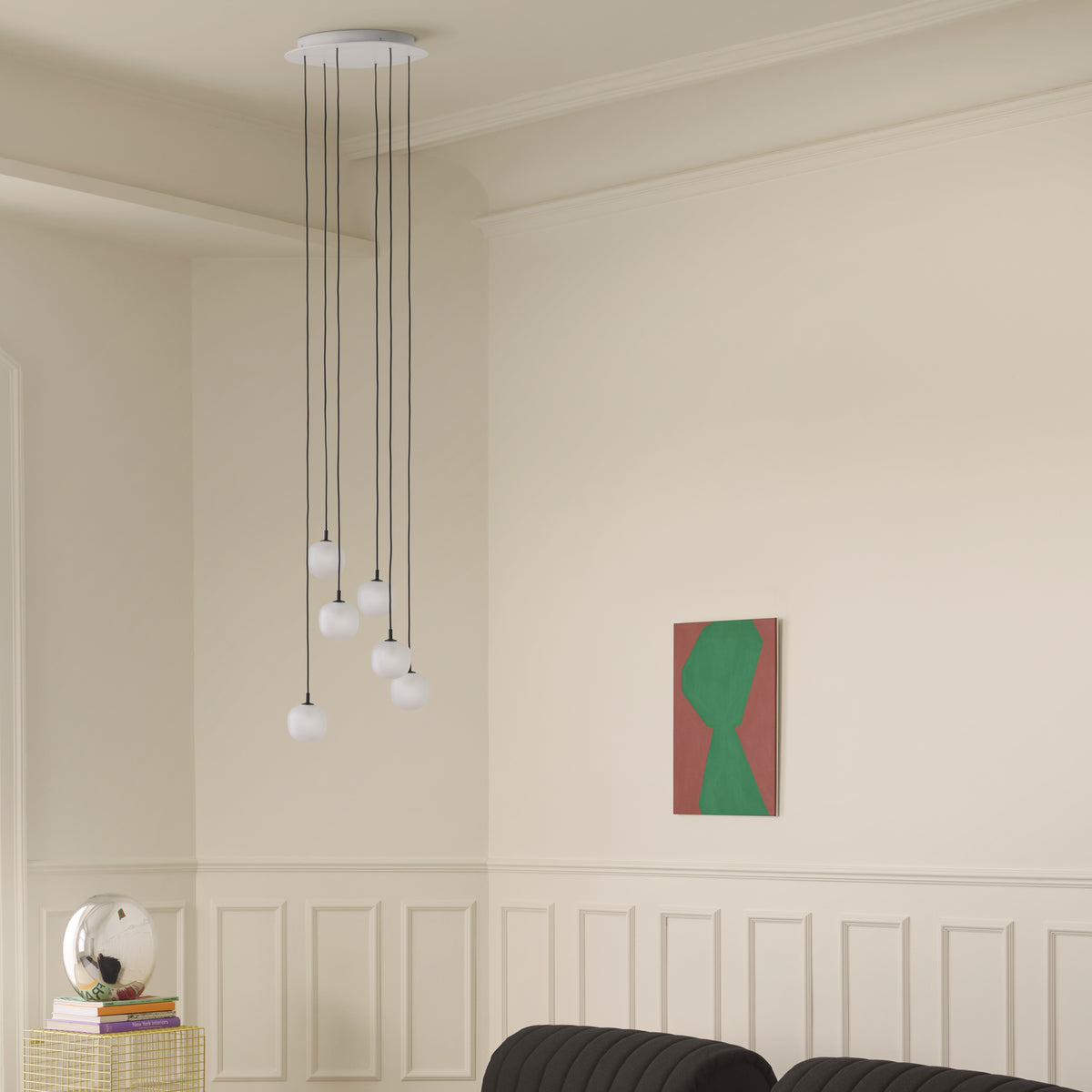 Muuto Cluster Canopy installation context with Rime pendant lamps above a Coltre sofa; pendant lamps sold separately