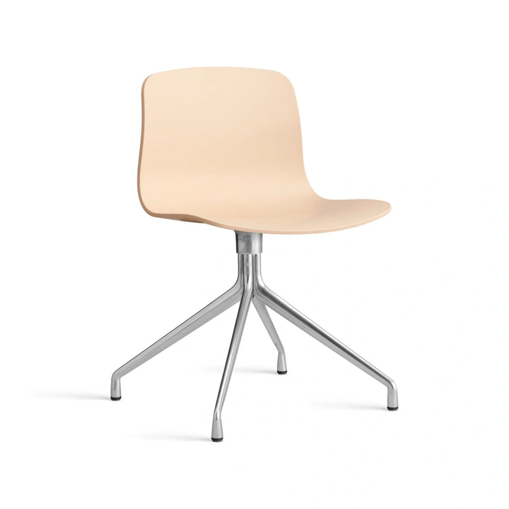 HAY AAC 10 hard shell in pale peach with a polished aluminium swivel base