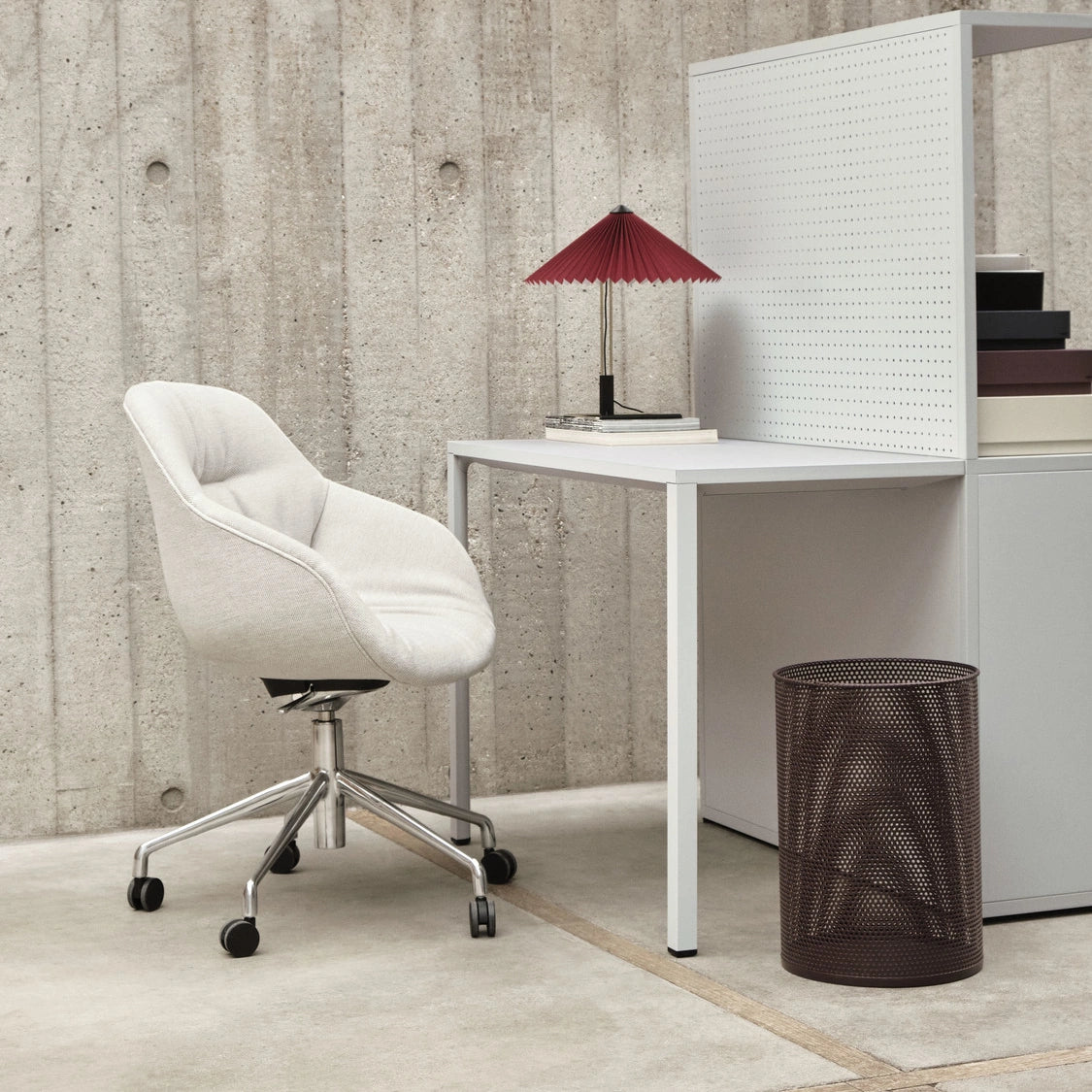 HAY AAC 155 Soft in Mode 009 with aluminium tilt swivel base at a desk with a Matin lamp