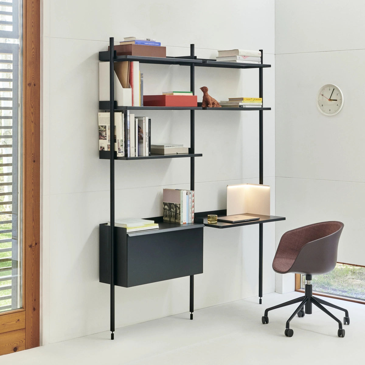 Family context: HAY AAC 52 front-upholstered office chair beside Pier System shelving