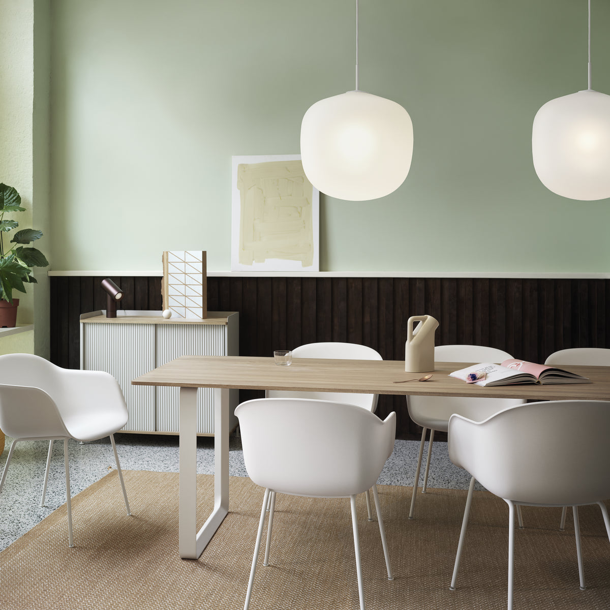Muuto 70/70 Table in solid oak with sand legs in a dining room with white Fiber chairs; size unspecified