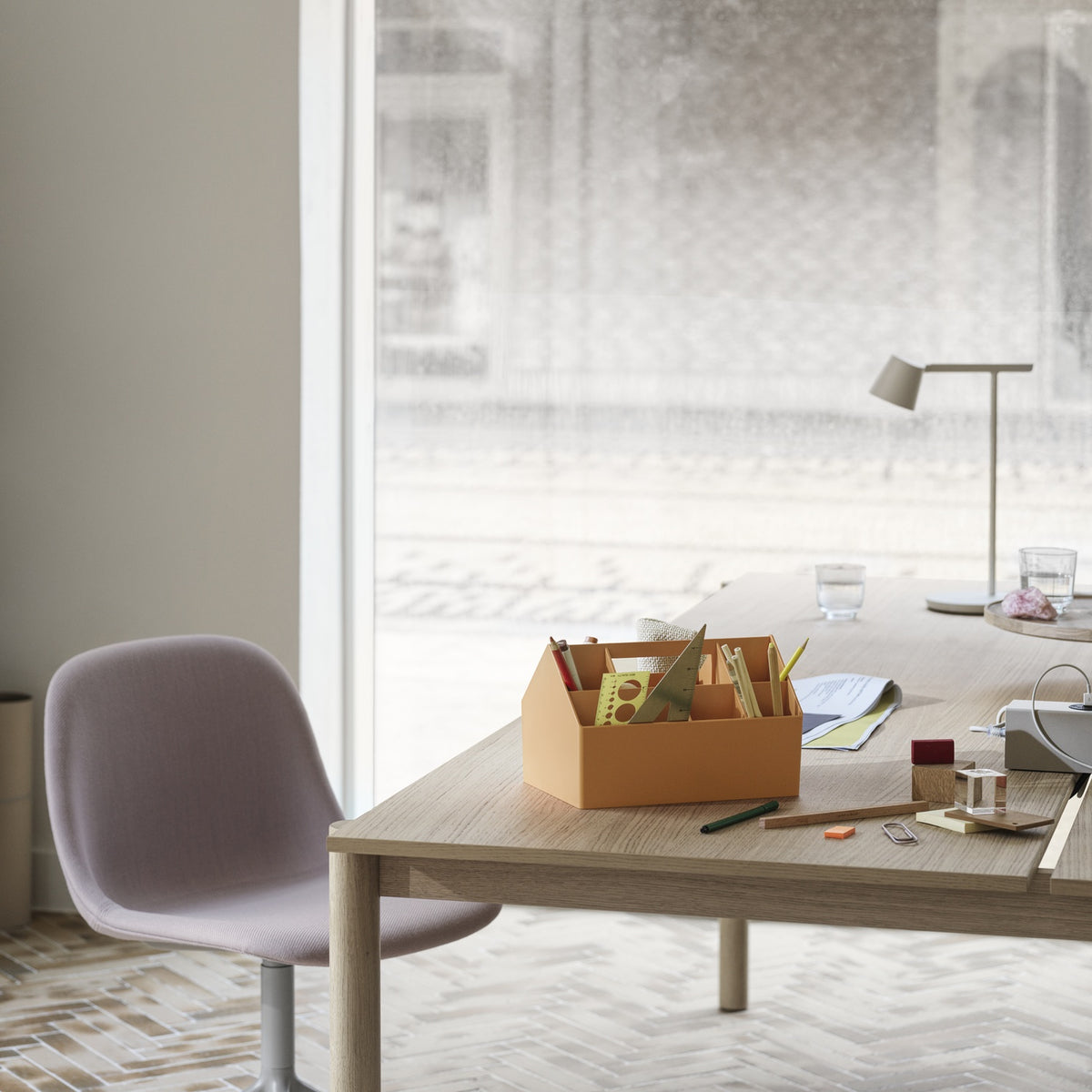 Muuto Sketch Toolbox shown in Burnt Orange on a desk; lifestyle context for the Sketch collection